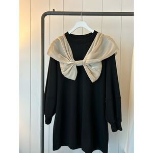 Black Dress with Gold Bow Accent